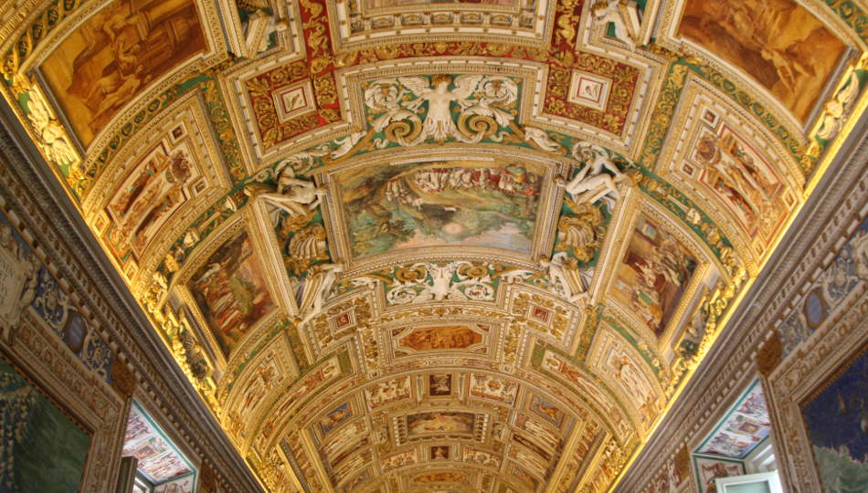 Guide with some visitors outside the Vatican Museums in Rome